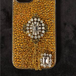 iPhone 15 Rhinstone one gold and gemstones case purple